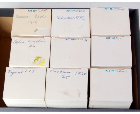 Nine various boxed John Day and Equipe 1/43 scale white metal classic car kits to include a Ferrari GTO, a Ferrari TR60, a Ja