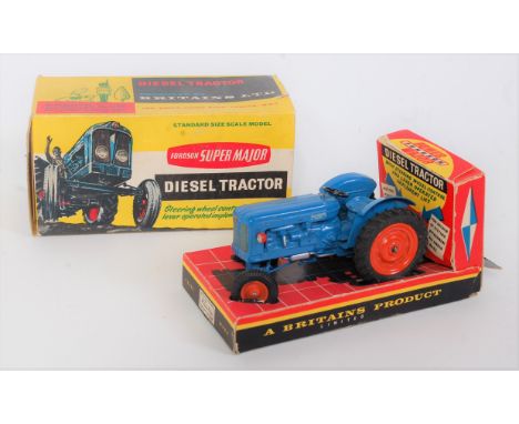 A Britains No. 172F Fordson Supermajor diesel tractor comprising of blue body with orange diecast hubs, rear lifting mechanis