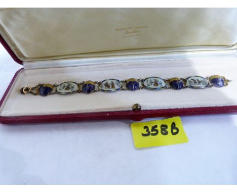 An Egyptian revival silver and enamel bracelet
