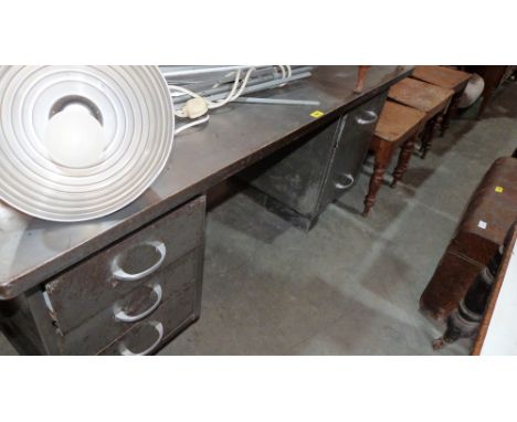 A steel 'industrial' office desk with fitted angled lamp. 60'' wide