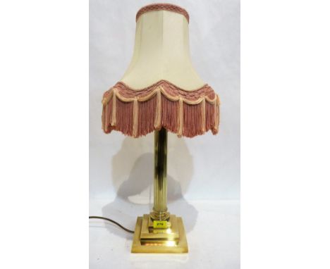 A brass reeded column table lamp