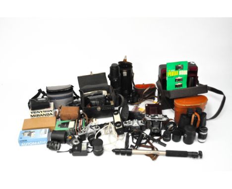 A large selection of vintage cameras and binoculars, including M42 telephoto lens, Pentax S3 no 399841, Pentax spotmatic SPII