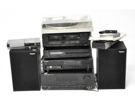 An extensive Hi Fi system, comprising; Harman Kardon AVI 200 audio and video amplifier, Pioneer PL-100 record deck, Hitachi S