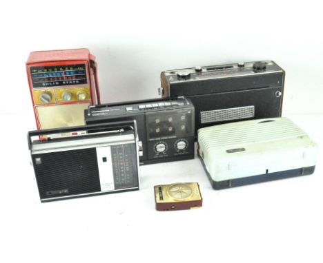 A selection of vintage radios, comprising a Transistor model R700, Roberts RP20 and more