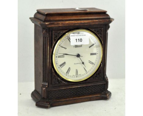 A vintage Hermle quartz mantle clock, the dial with Roman numerals denoting hours, 18cm high