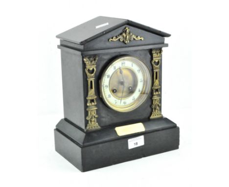 A late 19th/early 20th Century French slate mantel clock of architectural form, with brass embellishments to the front, with 
