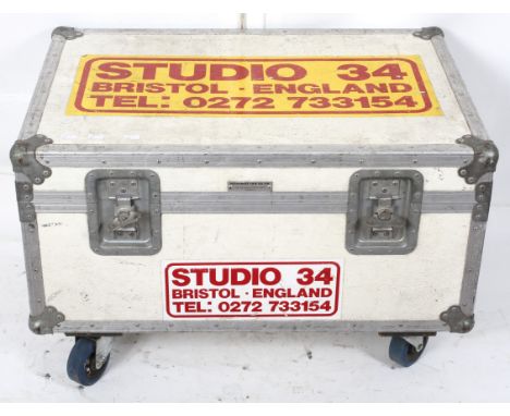 A 'Roadie' trunk, containing a large quantity of cables and wires, the exterior with a metal framework and leatherette effect