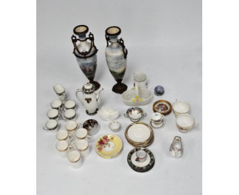 A Royal Doulton Art Forsyth tea service, a further part Royal Doulton coffee service, a tall pair of gilt metal mounted vases