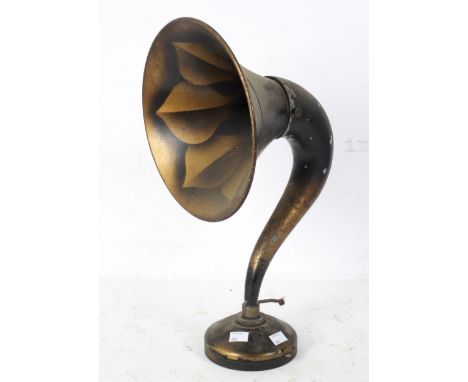 A retro horn speaker, the metal horn and base decorated with leaves, the base impressed XR351, P0910, height 47cm