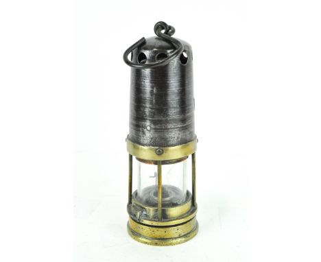 A metal and brass fitted miners lamp, British made, indistinctly stamped 'Guy', height 24cm