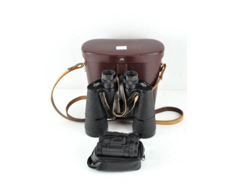 A pair of Carl Zeiss Jena Binoctem 7x50 binoculars, in original leather case, together with a pair of Minox 8x21 binoculars, 