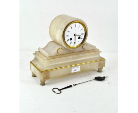 A early 20th Century alabaster mantel clock, on a plinth base with gilt details, the white dial mounted in brass with Roman n