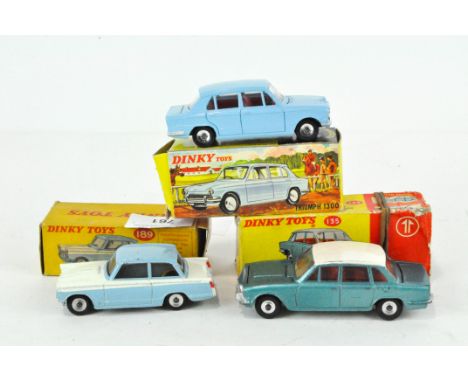 A Dinky Toys No. 189 Triumph Herald, light blue/white body, together with a No. 135 Triumph 2000, light blue/white body and a