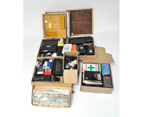 A selection of vintage ZX spectrum's and related equipment, including model +2 &amp; +3, disks, books, accessories and more