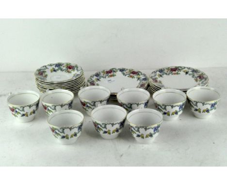 A Booths part tea service "Floradora" pattern, comprising tea cups, saucers, side plates and more, serial A8084