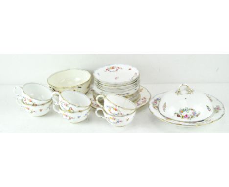 A Mintons part tea service, comprising six cups, saucers and small plates, a serving plate, tureen and bowl, all decorated wi