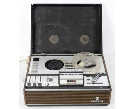 A vintage Grundig TK-146 reel to reel recorder, fitted in wood effect, black and chromed hinged case, 14cm x 37.5cm x 28cm 