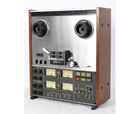 A TEAC 4-channel stereo reel to tape deck, A-3340S, with an operating speed of 15 ips, together with a manufacturing manual, 
