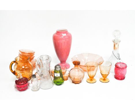 A collection of assorted vintage glassware, including a pink vase with enamel flowers, a decanter, an amber coloured liqueur 