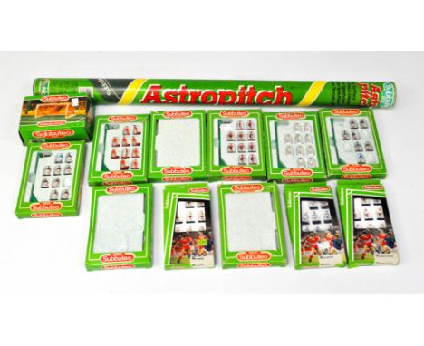 An assortment of vintage Subbuteo football players and accessories, including West Ham Utd, Scotland, Spurs and others
