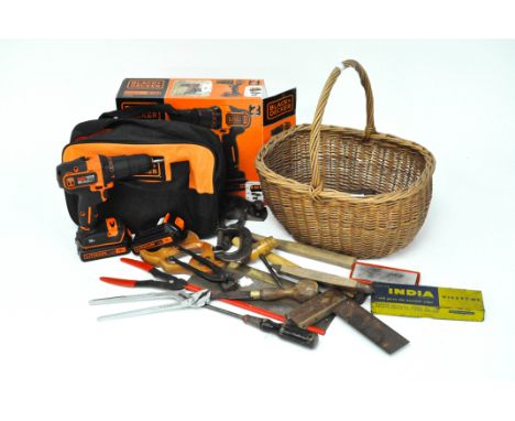 A Black and Decker Lithium 18V drill, in box, together with a basket of vintage tools