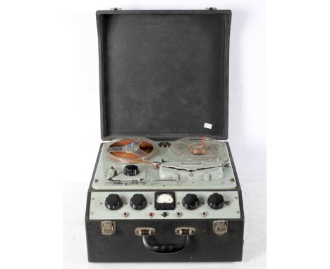 A portable Ferrograph Reel to Reel reel to reel recorder, serial number etched off, within a grey travelling case, 43cm x 44c