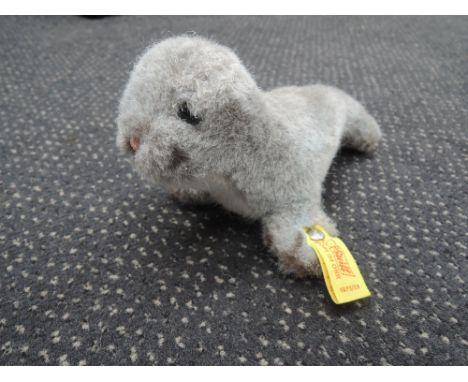 A modern Steiff Seal, having yellow tag and silver button
