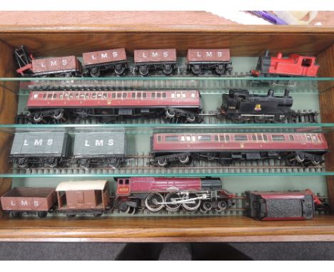 A Hornby OO gauge 4-6-2 loco and tender, Princess Elizabeth, two Triang OO gauge tank engine, two carriages and rolling stock