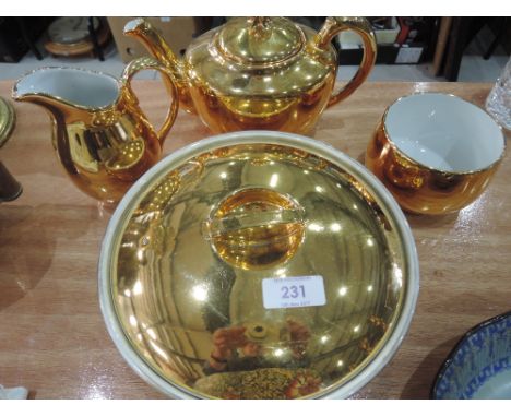 A Royal Worcester gilt tea set and tureen