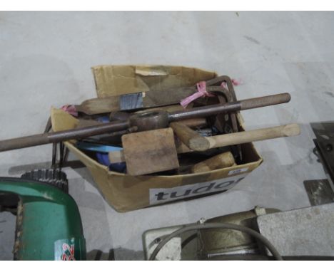 A box of vintage tools including pipe threader?