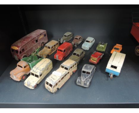 Fifteen Dinky and Matchbox die-casts including early saloon cars, horse box, Dunlop van etc
