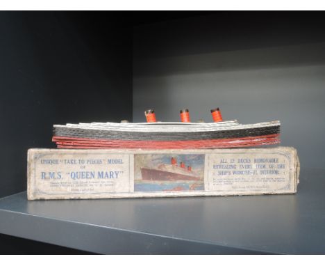 A Chad Valley model RMS Queen Mary liner with all twelve decks removable, in original box