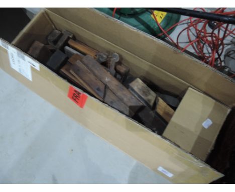A box of vintage wood planes