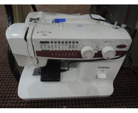 A Brother XL5011 electric sewing machine with manual