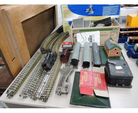 A selection of Hornby Dublo OO gauge rolling stock, track and accessories and a OO gauge 0-6-0 tank engine