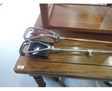 Two vintage shooting sticks