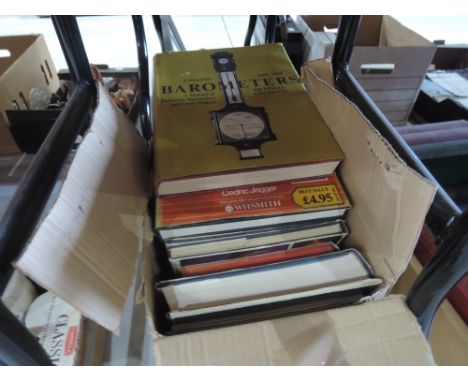 A box of books including Antique clock and barometer interest