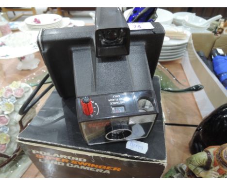 A Polaroid Super Swinger Land Camera