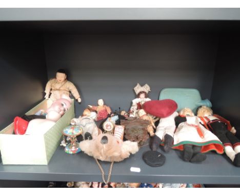 A shelf of bisque and composition dolls, doll parts, accessories etc including Armand Marseille etc