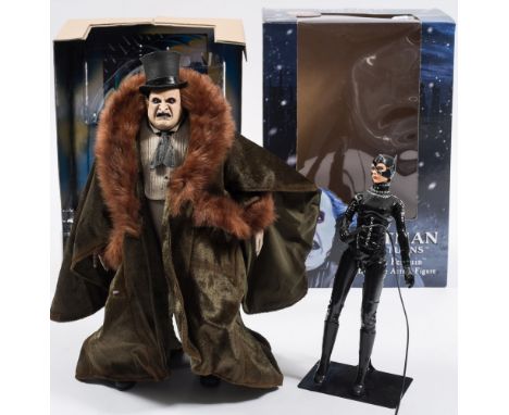 A Neca 1/4th scale Batman Returns 'Penguin' figure in box and a loose 1/6th scale 'Catwoman' figure:,  (2)