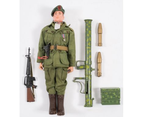 A Palitoy Action Man painted head American Green Berret:, in uniform with medal, bazooka, machine gun and accessories. 