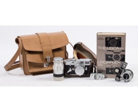 A  chrome finish Leica M3 35MM  No 1079 820:, fitted Leitz Wetzlar  1:2 50mm lens in original brown leather case, together wi