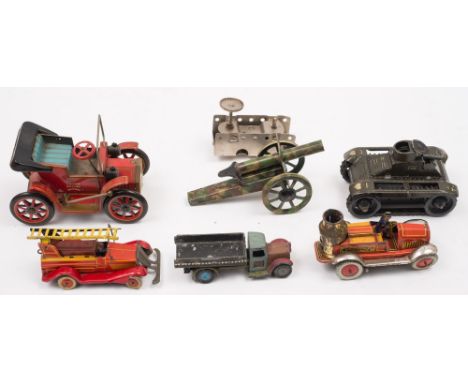 A Gama tinplate clockwork tank, together with a Japanese tinplate car and a small collection of tinplate vehicles etc:, inclu
