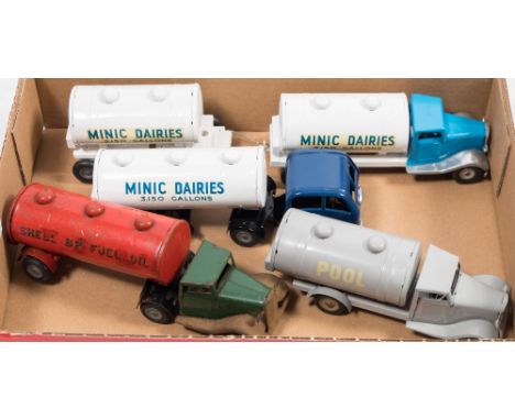 A Tri-ang Minic clockwork articulated tanker in 'Shell BP Fuel Oil' livery:, together with  three other tankers and a tanker 