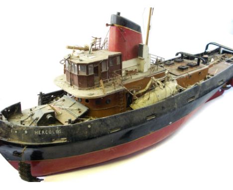 A radio control scale model of TMB 'Hercules':,  red and black funnel over wheel house and detailed decks with davits and lif