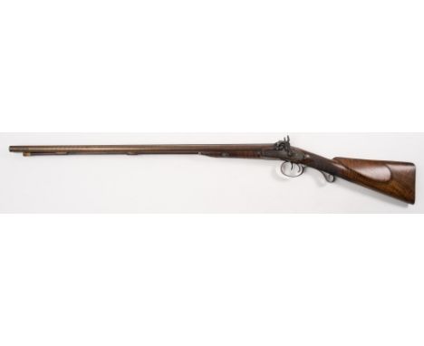 A double barrel percussion cap shotgun by D Long:, 30 inch Damascus barrels with engraved tang, signed and engraved sidelock 