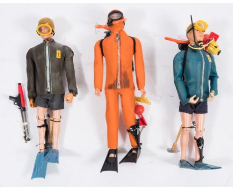 An Action Man flock hair Skin diver with underwater camera:, together with one other skin diver and an orange frogman (3).