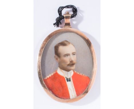 A late 19th century overpainted miniature portrait photograph of an officer:, signed in pencil 'Esme Collings' within a 9ct g