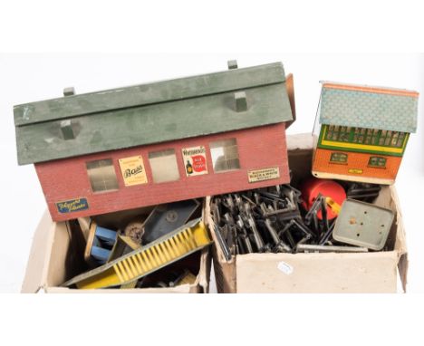 A selection of Hornby O gauge rolling stock: including Petrol Wagon, Timber Wagon, Open Coal Wagons, Signal cabin, Water Tank