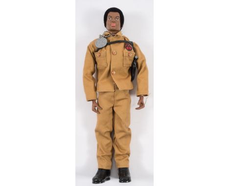 A Hasbro GI Joe flock hair Tom Stone figure:, in uniform with plastic dog tag 